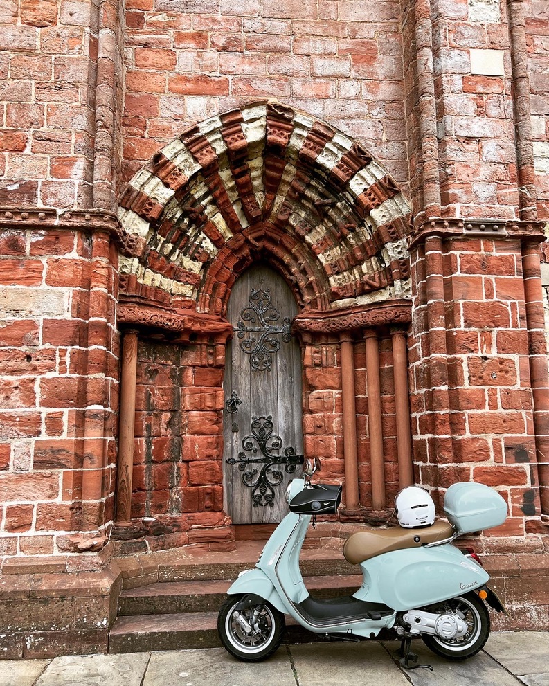 Baby blue vespa at St Magnus Cathedral, Orkney Islands, Scotland (2022)